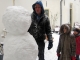 looking up to their first snowman